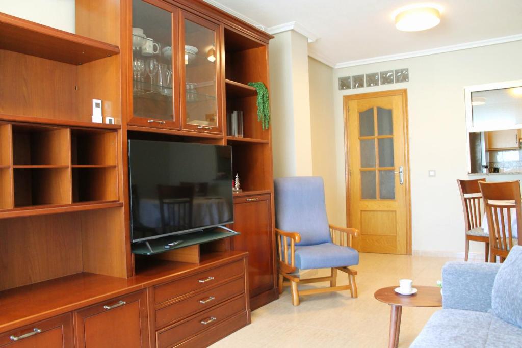 TV a/nebo společenská místnost v ubytování Comfortable Apartment in Excellent Location