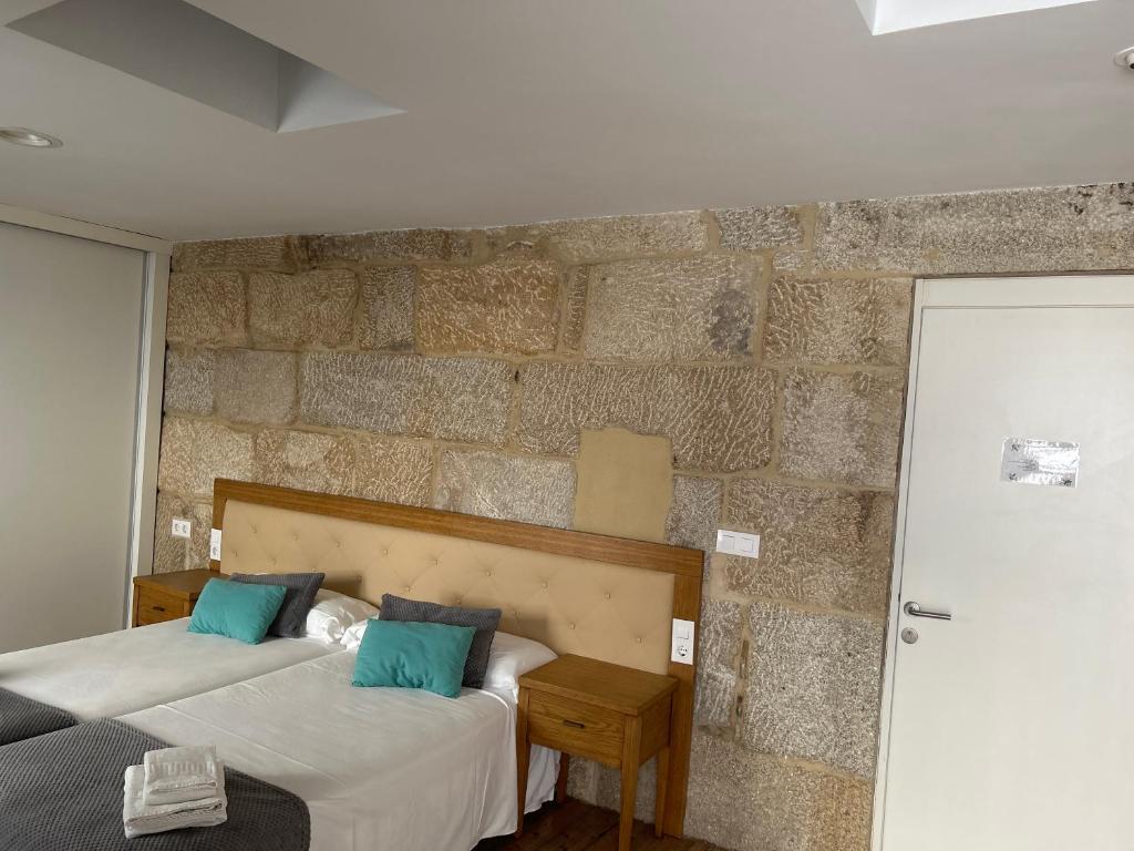 Postel nebo postele na pokoji v ubytování Pazo Pias P
