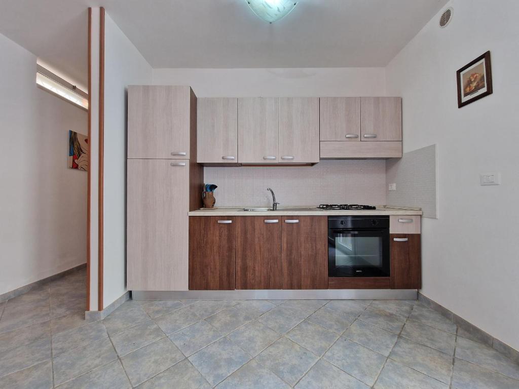 A kitchen or kitchenette at Casa Vacanza Maria Fronte mare