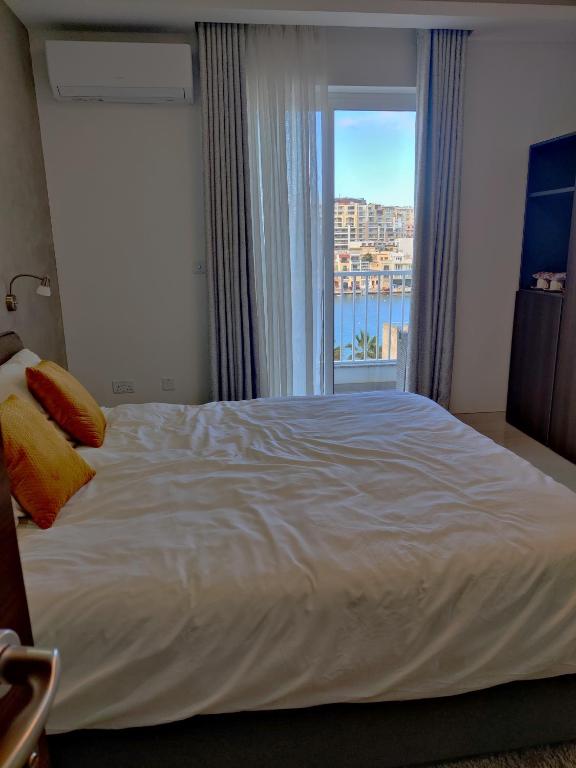 Postel nebo postele na pokoji v ubytování SouthShore Accommodation