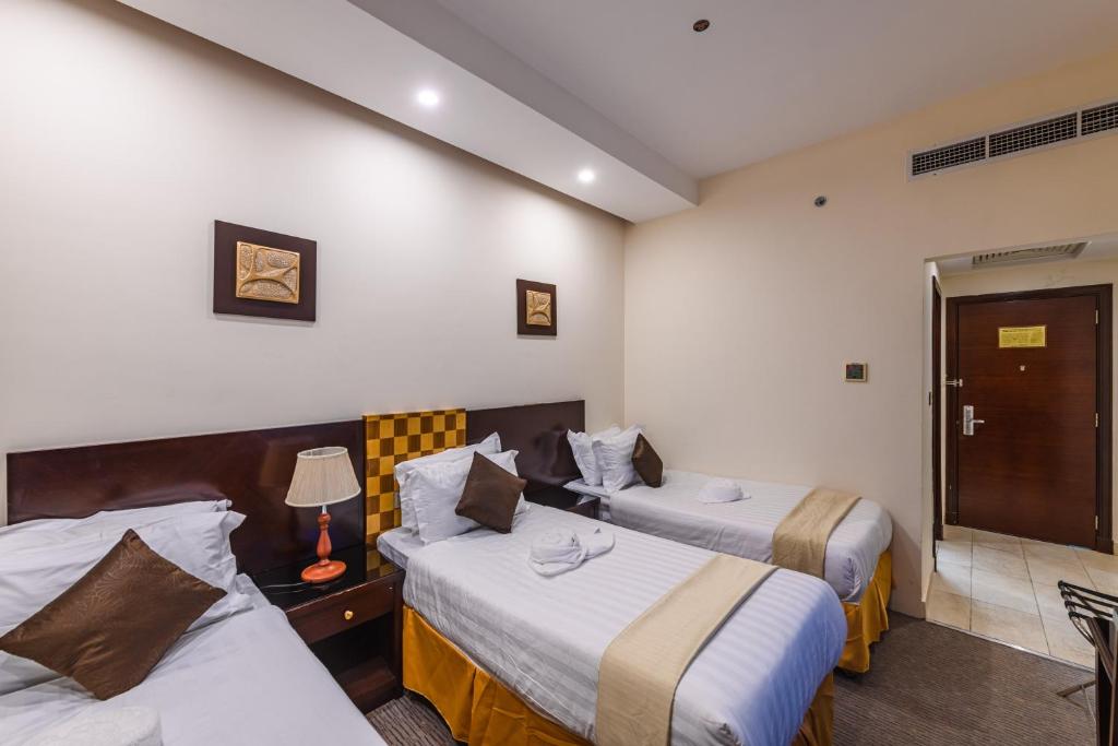 Joury Al Mashaer Hotel - 三个房间
