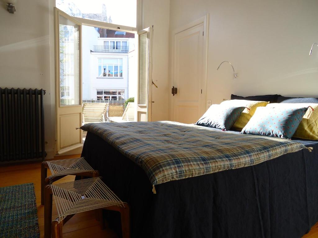 Postel nebo postele na pokoji v ubytování Maison Flagey Brussels