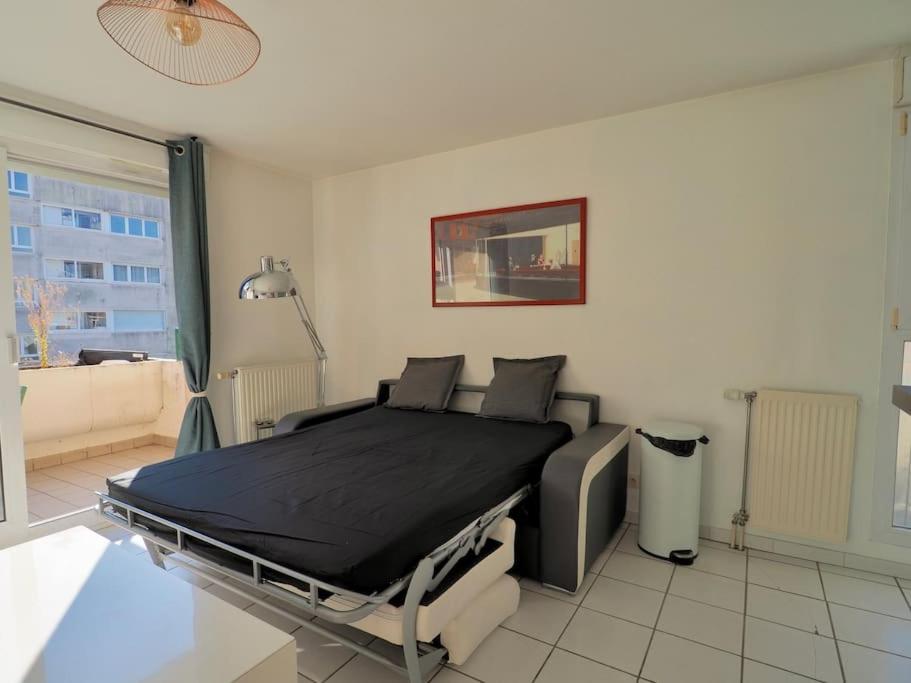 Posteľ alebo postele v izbe v ubytovaní Aix-les-Bains appartement centre ville avec terrasse et box privé
