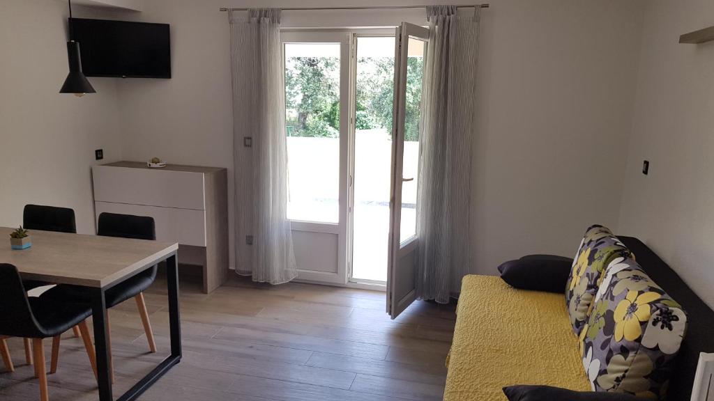 TV a/nebo společenská místnost v ubytování Premium Appartments Suha Punta