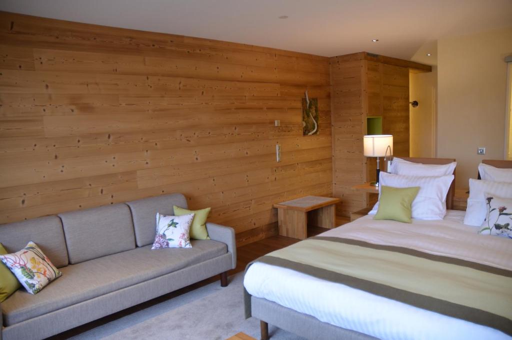 Postel nebo postele na pokoji v ubytování Hotel Le Caballin