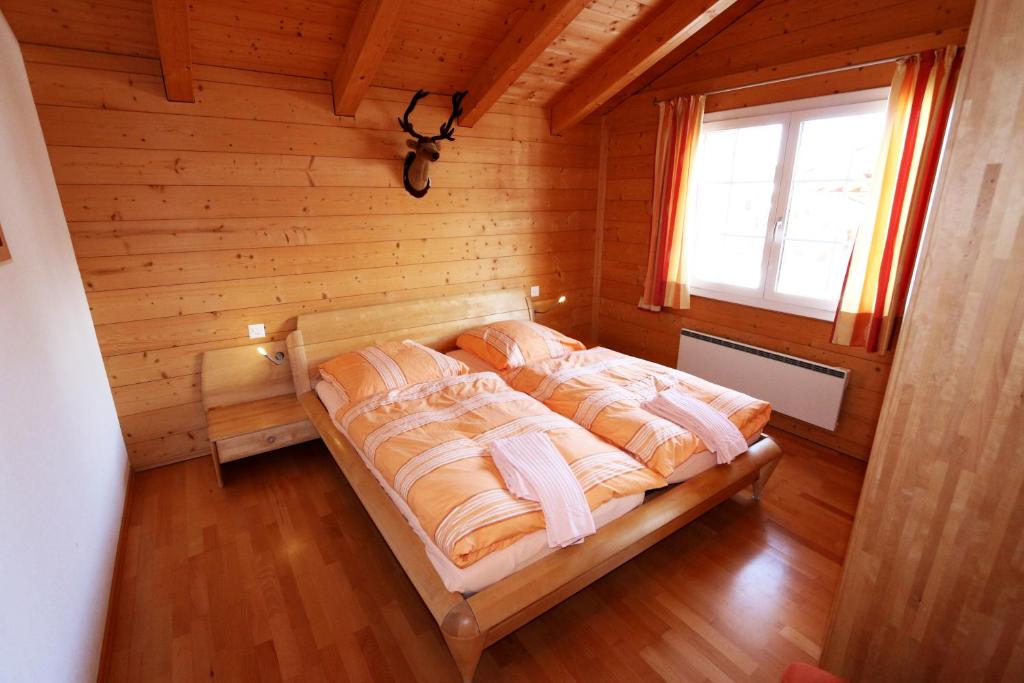 Postel nebo postele na pokoji v ubytování Chalet Inge