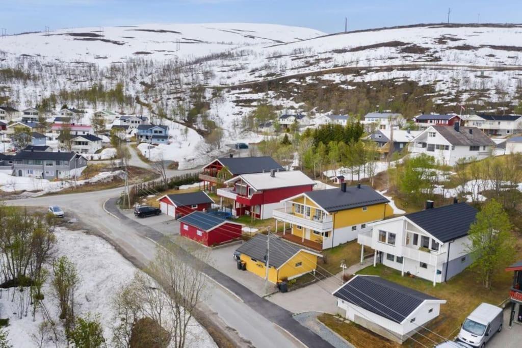 an aerial view of a small town in the snow at Apartment, 4km fra Tromsøsentrum. flyplass 1.71km. in Tromsø