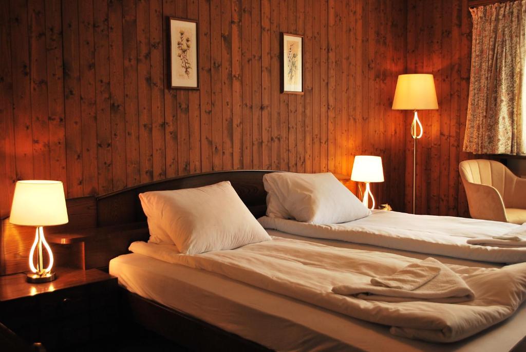 Postel nebo postele na pokoji v ubytování Rooms with Private bathrooms
