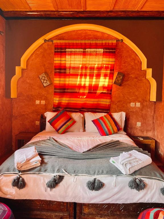 Postel nebo postele na pokoji v ubytování Kasbah Imlil