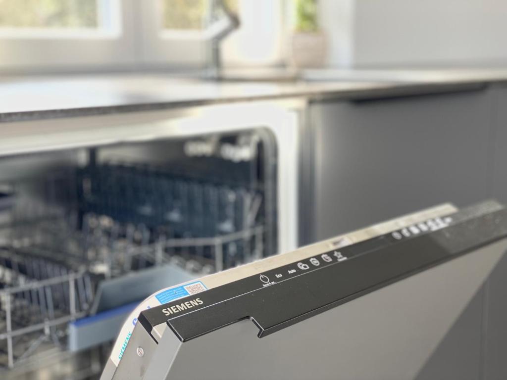 Kuchyň nebo kuchyňský kout v ubytování APARTMENT RIVA Lenno