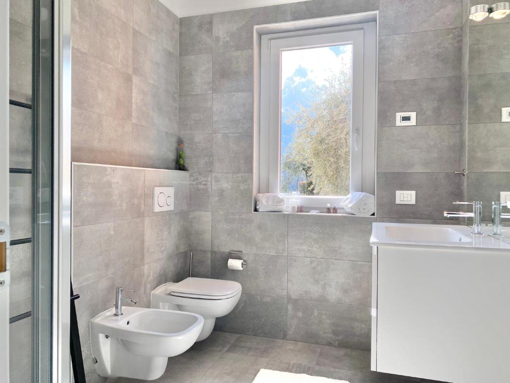 Koupelna v ubytování APARTMENT RIVA Lenno