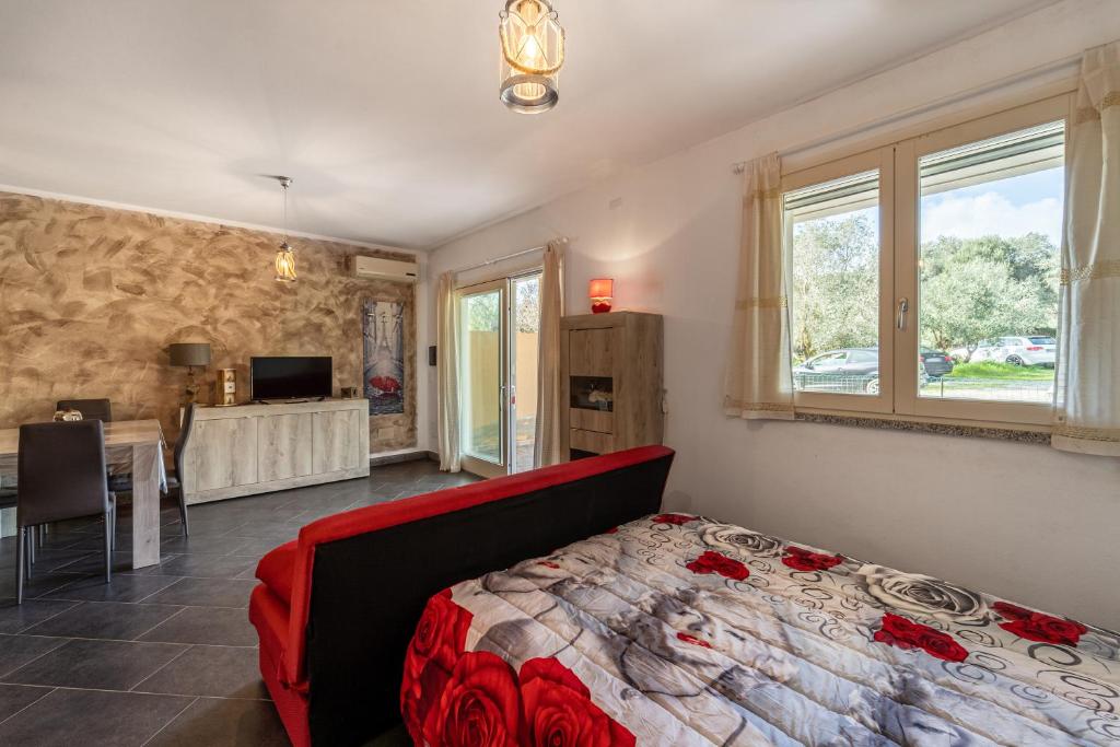 A bed or beds in a room at Open Space nel Sulcis