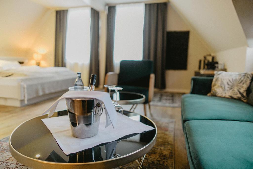Postel nebo postele na pokoji v ubytování Peak Hotel & Event