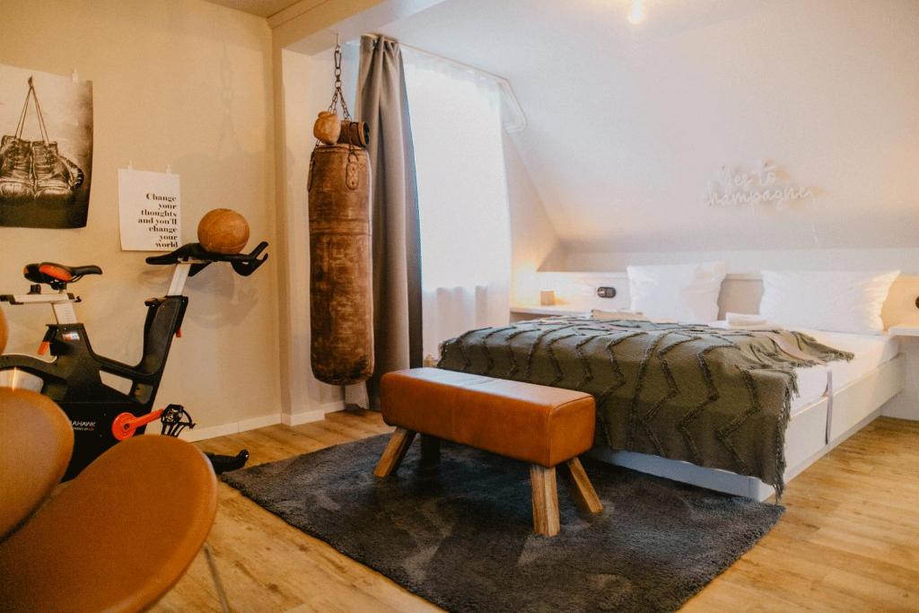 Postel nebo postele na pokoji v ubytování Peak Hotel & Event