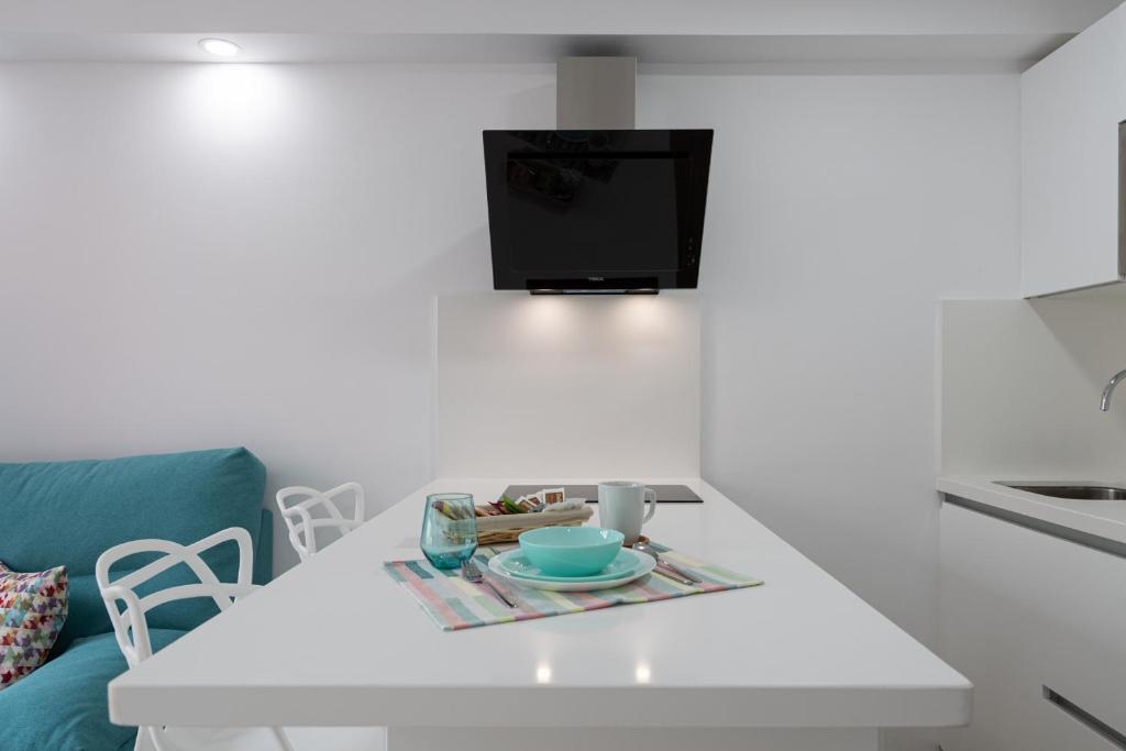 Kuchyňa alebo kuchynka v ubytovaní Petit Accommodation Las Canteras Troisième