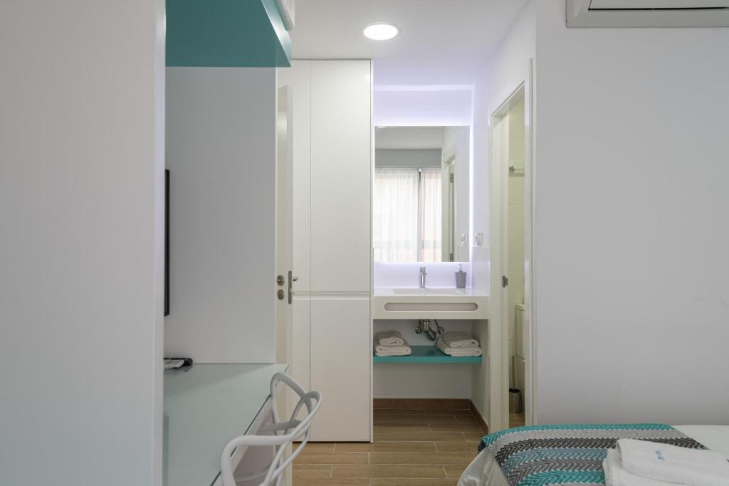 Posteľ alebo postele v izbe v ubytovaní Petit Accommodation Las Canteras Troisième