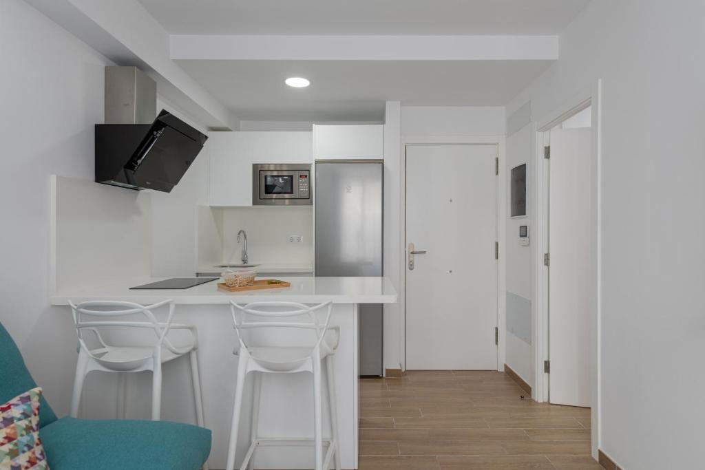 Kuchyňa alebo kuchynka v ubytovaní Petit Accommodation Las Canteras Troisième