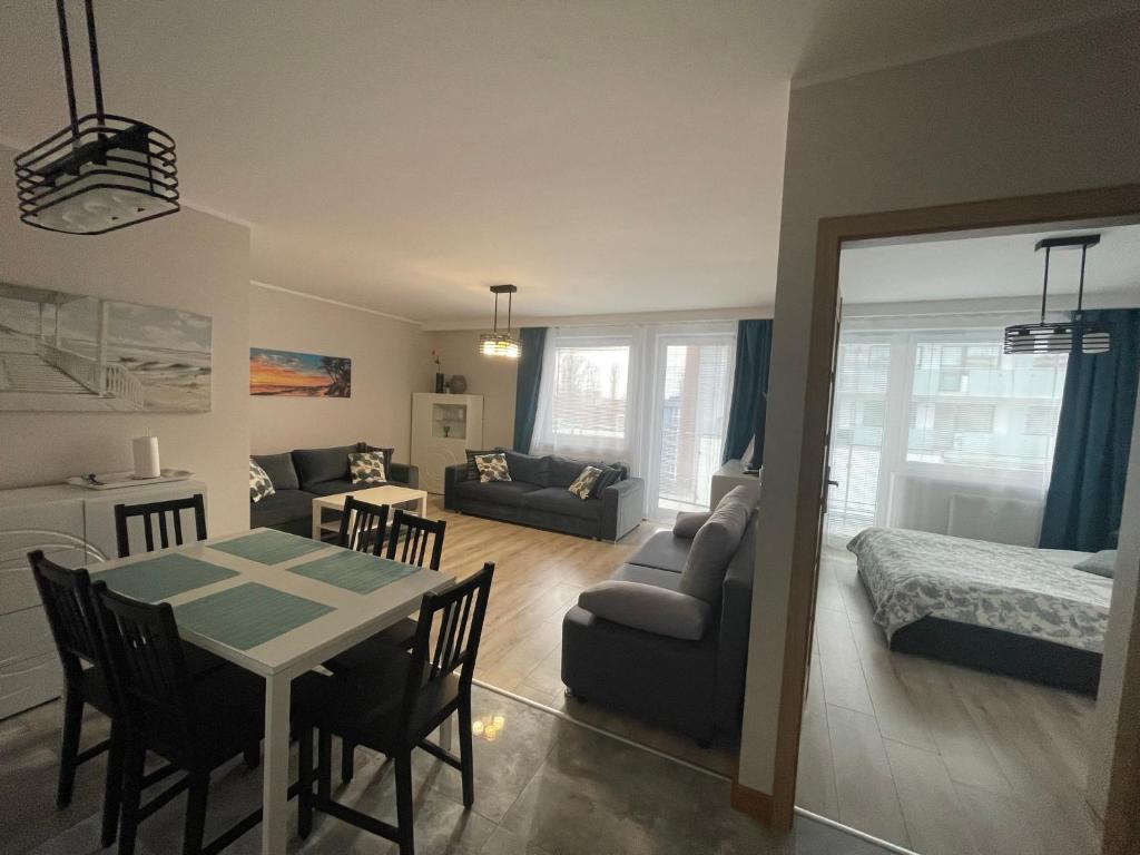 Posteľ alebo postele v izbe v ubytovaní Bliżej Morza Luxury Apartments