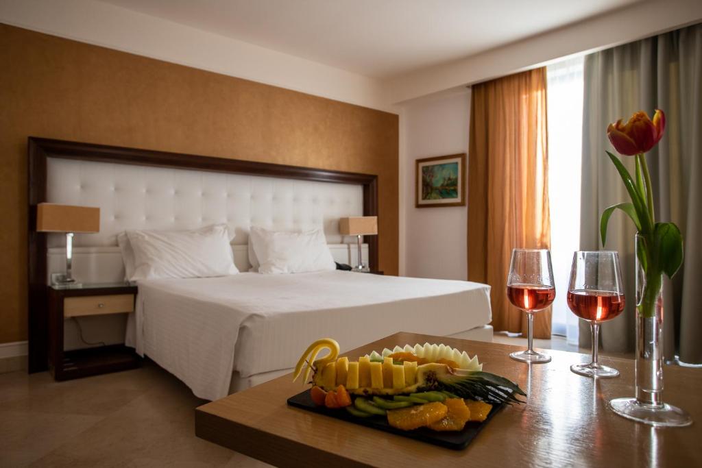Postel nebo postele na pokoji v ubytování Vittoria Resort Pool & SPA