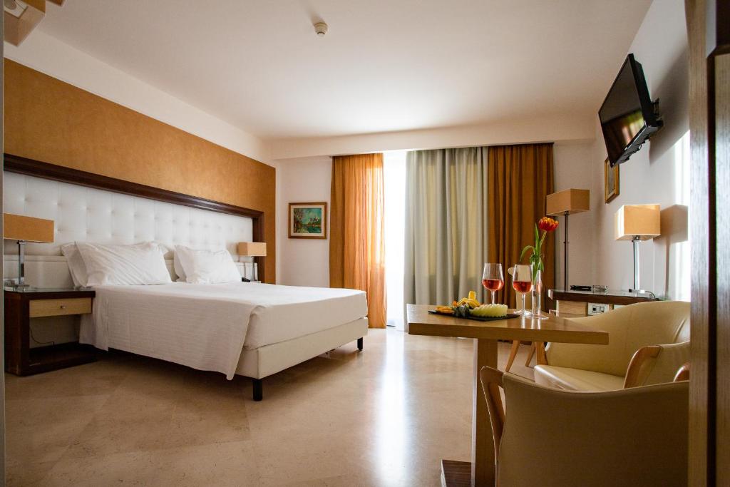 Postel nebo postele na pokoji v ubytování Vittoria Resort Pool & SPA
