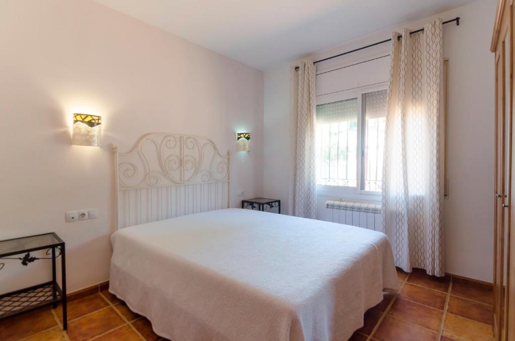 Postel nebo postele na pokoji v ubytování Club Villamar - Arboc