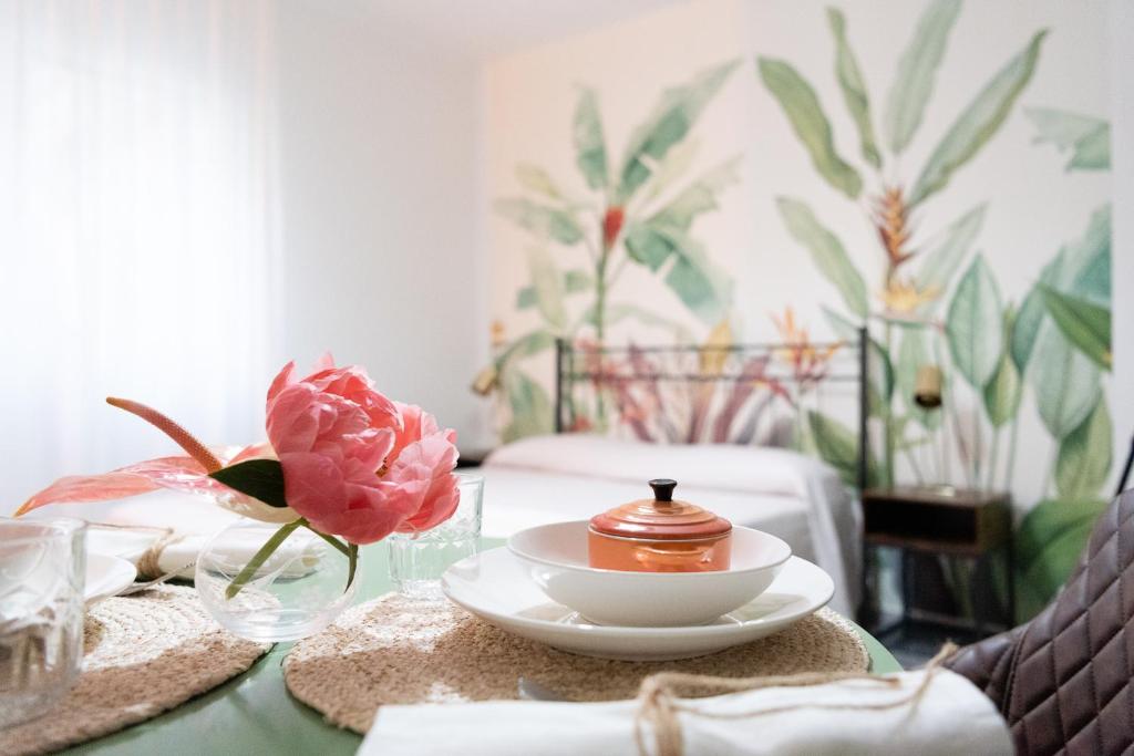 Letto o letti in una camera di BOTANIC GUESTHOUSE ESTE
