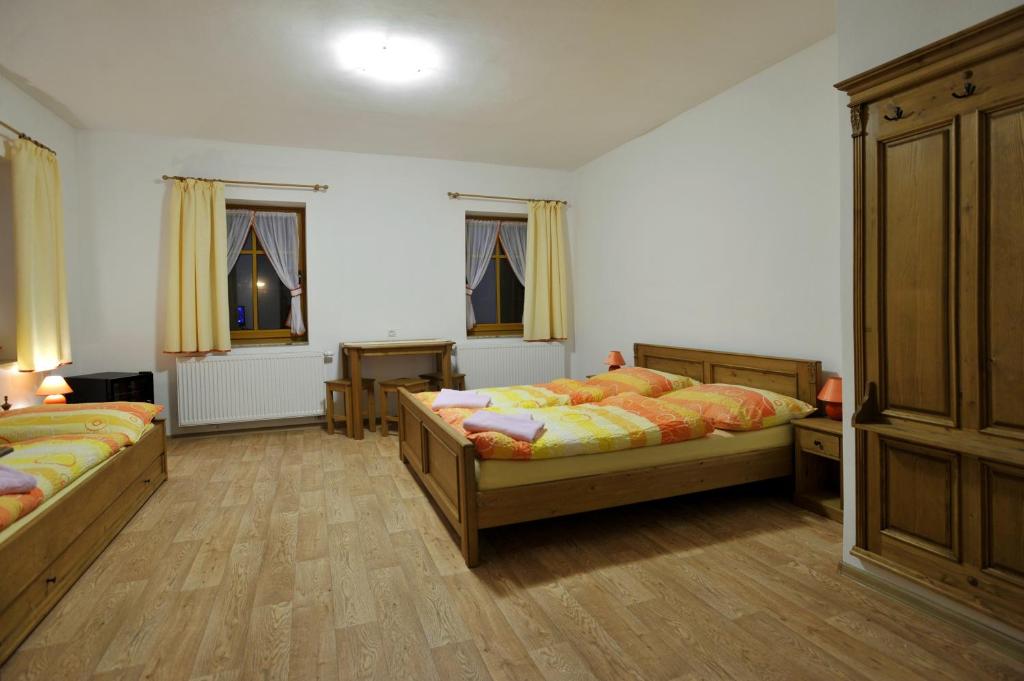 Postel nebo postele na pokoji v ubytování Resort Abertham - penzion Ellen