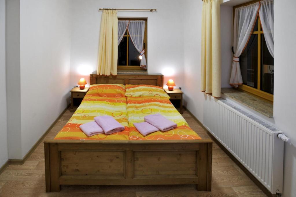 Postel nebo postele na pokoji v ubytování Resort Abertham - penzion Ellen