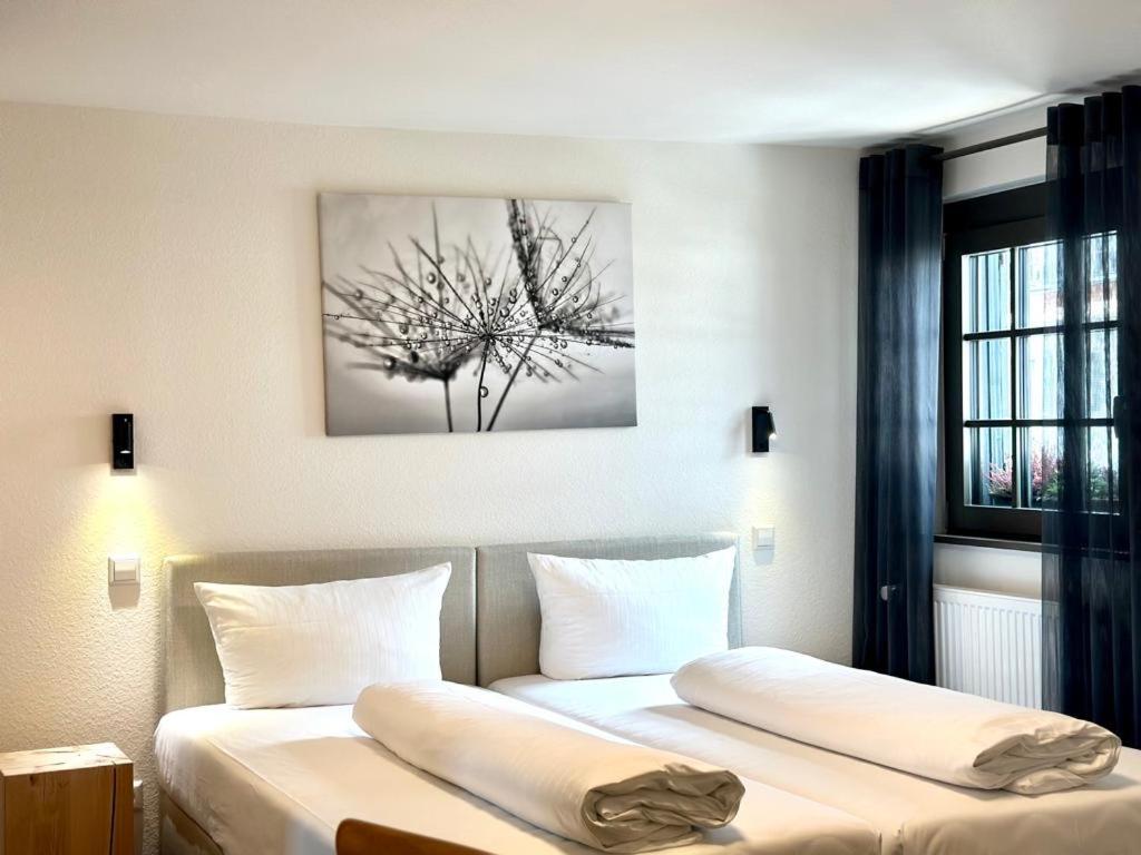 Postel nebo postele na pokoji v ubytování Hotel Ochsen