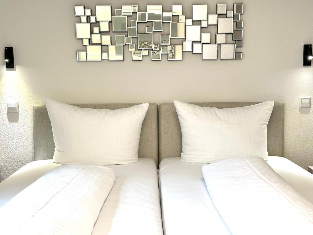 Postel nebo postele na pokoji v ubytování Hotel Ochsen