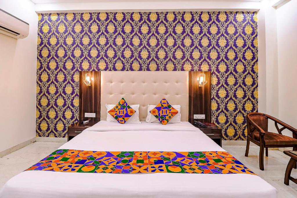 Postel nebo postele na pokoji v ubytování FabHotel Swess Grand