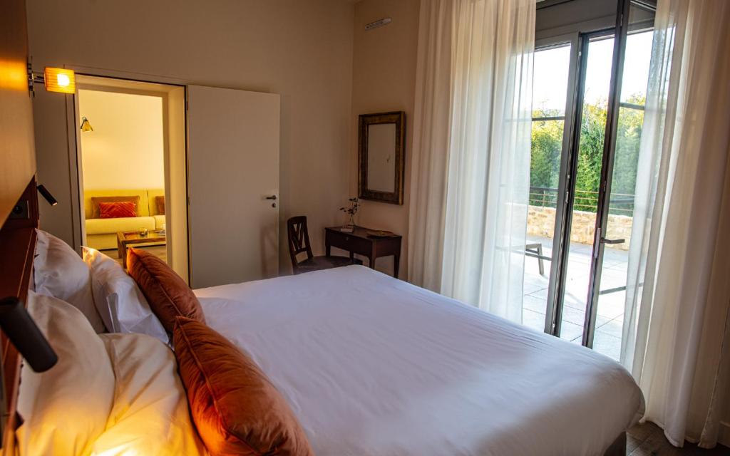 Postel nebo postele na pokoji v ubytování Hôtel Villa Walbaum