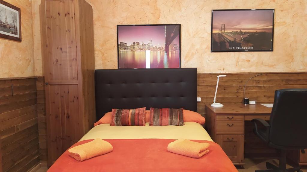 Voodi või voodid majutusasutuse Casa Axier-Chalet con Piscina privada y chimenea toas