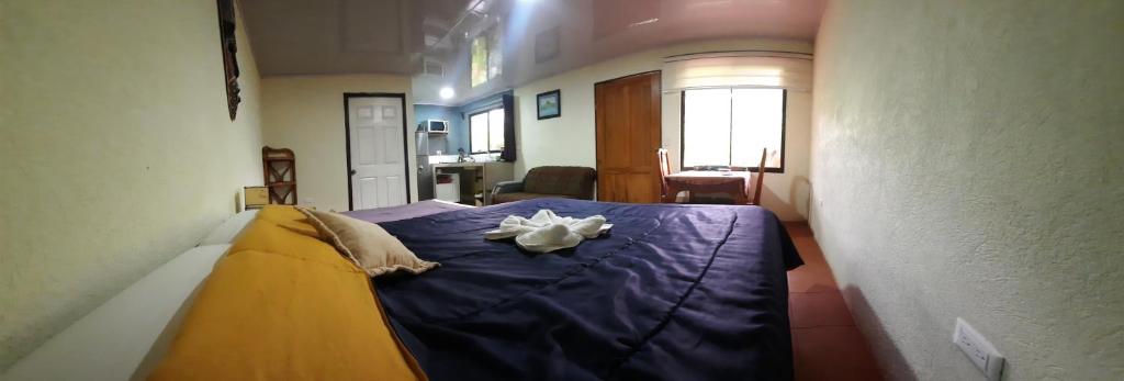 Postel nebo postele na pokoji v ubytování Granja Agua Azul, Wi-FI,AC-WC,Parking,la Fortuna