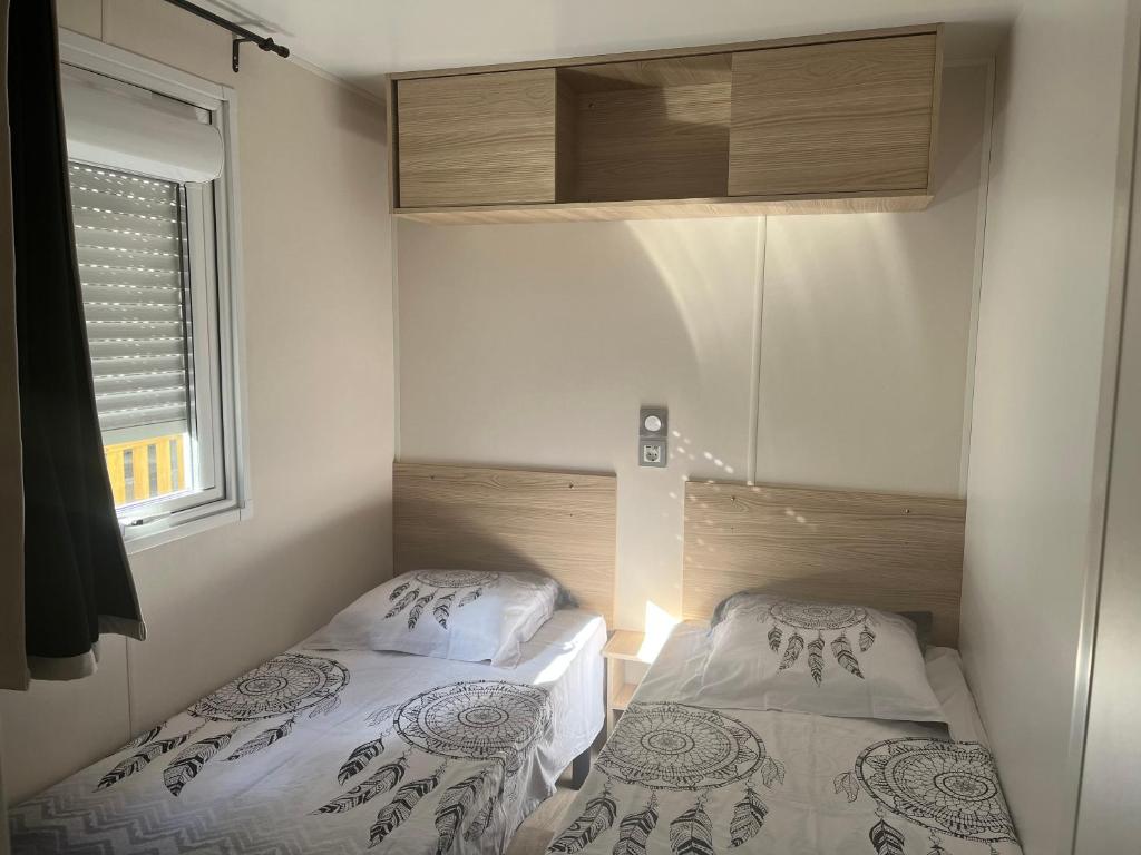 Postel nebo postele na pokoji v ubytování Cap Rêve