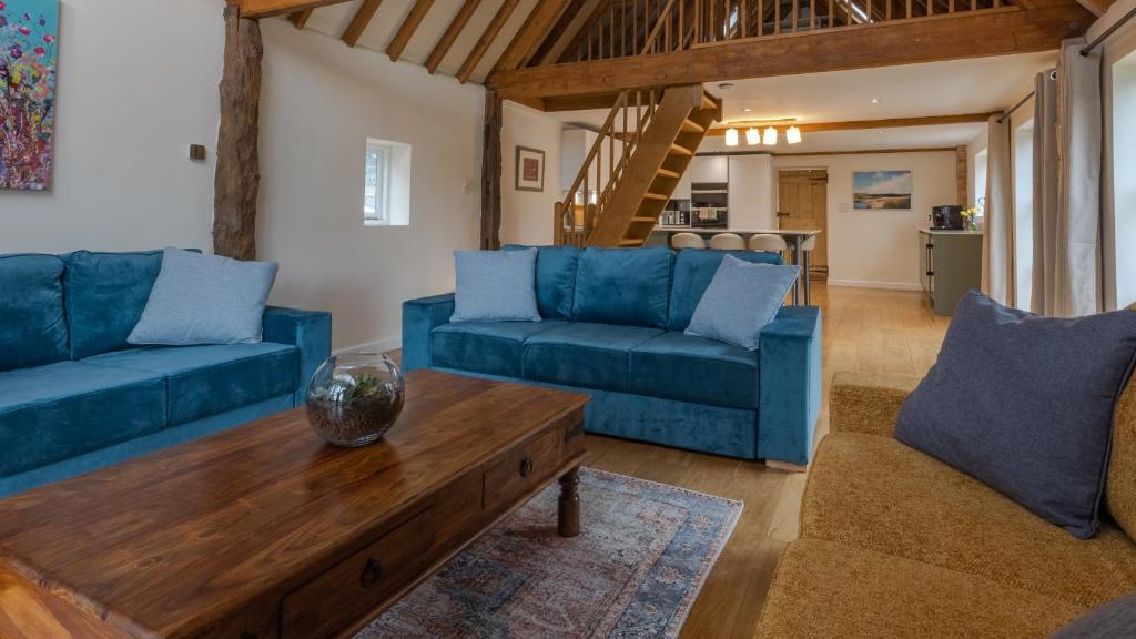 Posezení v ubytování West Farm Cottage
