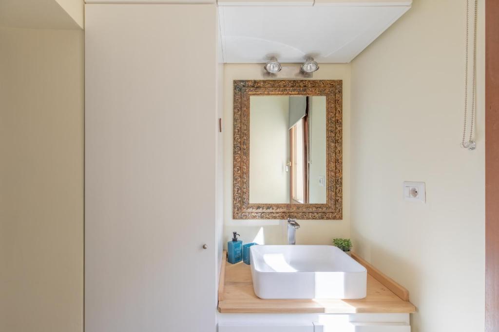 A bed or beds in a room at iFlat The Heart of Monti