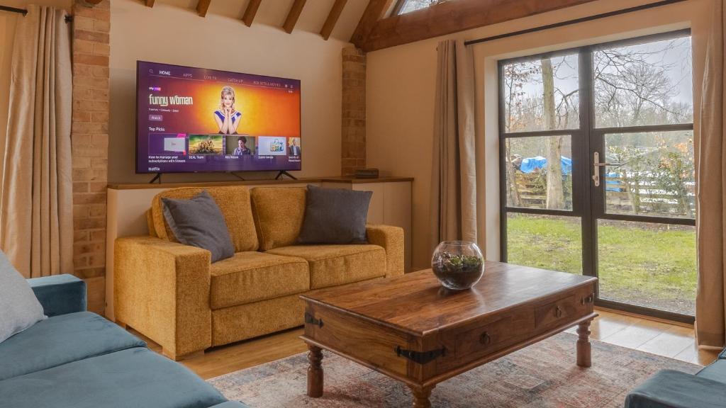 TV a/nebo společenská místnost v ubytování West Farm Cottage