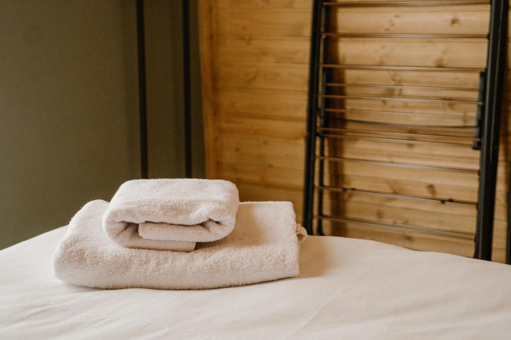 Postel nebo postele na pokoji v ubytování Mestia Villas