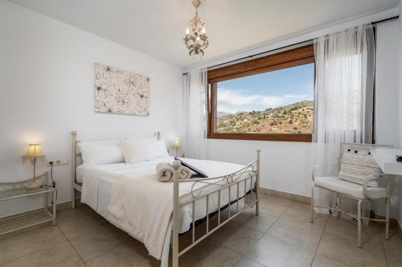Postel nebo postele na pokoji v ubytování Hotel La Casa