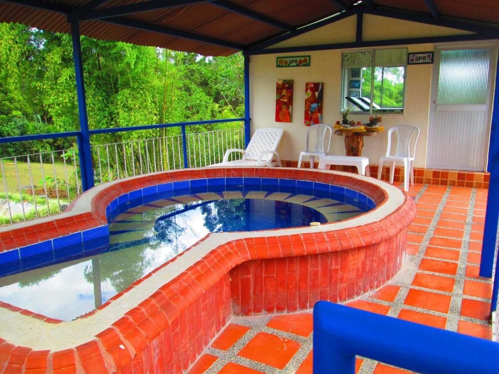 Bazén v ubytování Hotel Campestre El Refugio de Balsora nebo v jeho okolí