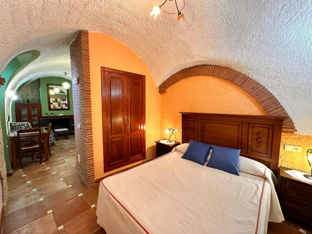 Cama o camas de una habitación en Cuevas La Granja