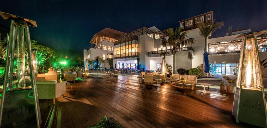 a lobby of a hotel with a wooden floor at Fuerteventura Princess in Playa Jandia