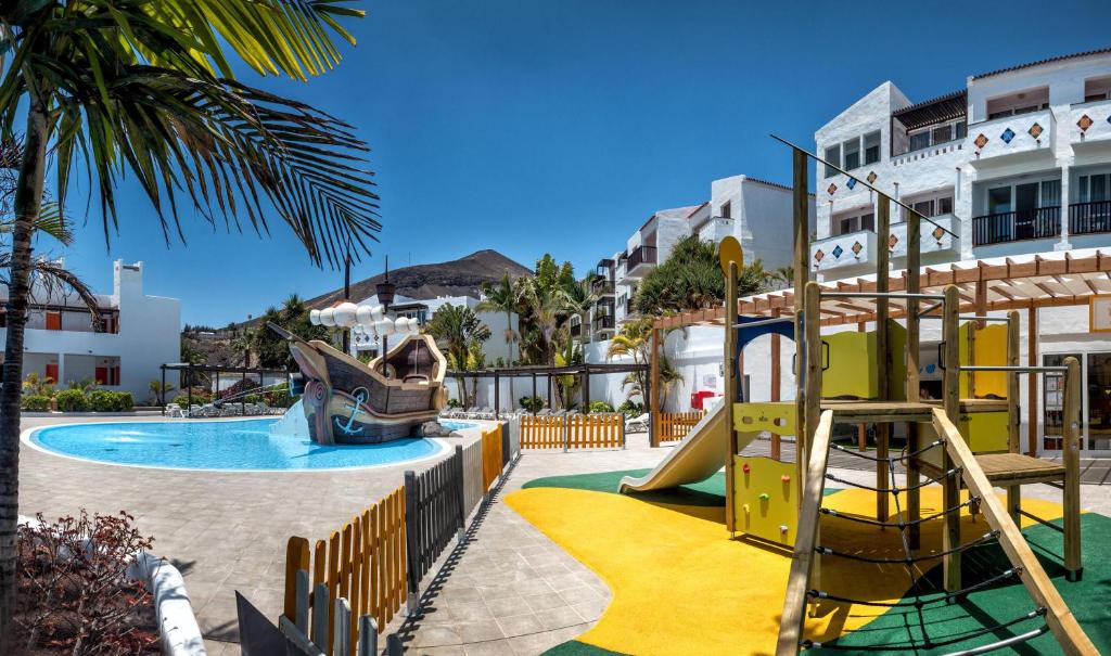 a playground at a resort with a slide at Fuerteventura Princess in Playa Jandia