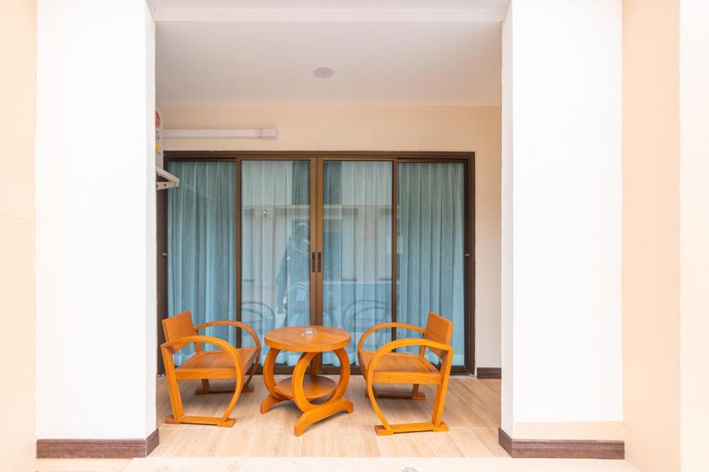 Posezení v ubytování Peacock De Pai Hotel
