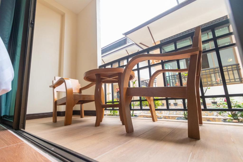 Balkón nebo terasa v ubytování Peacock De Pai Hotel