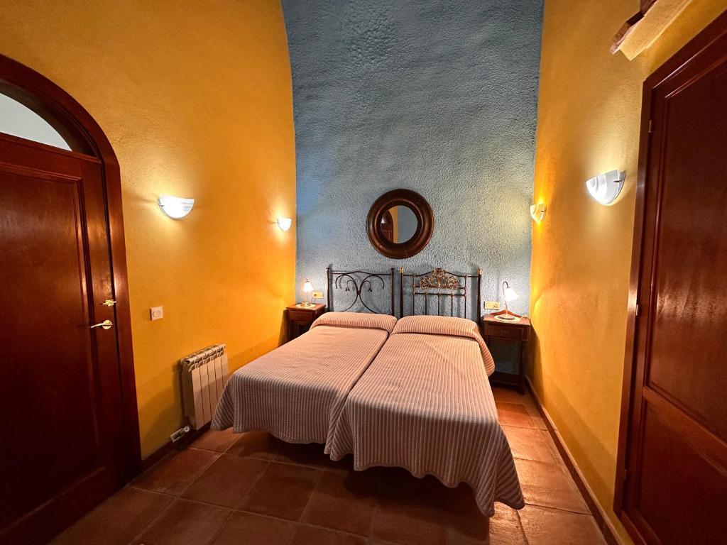 Cama o camas de una habitación en Cuevas La Granja