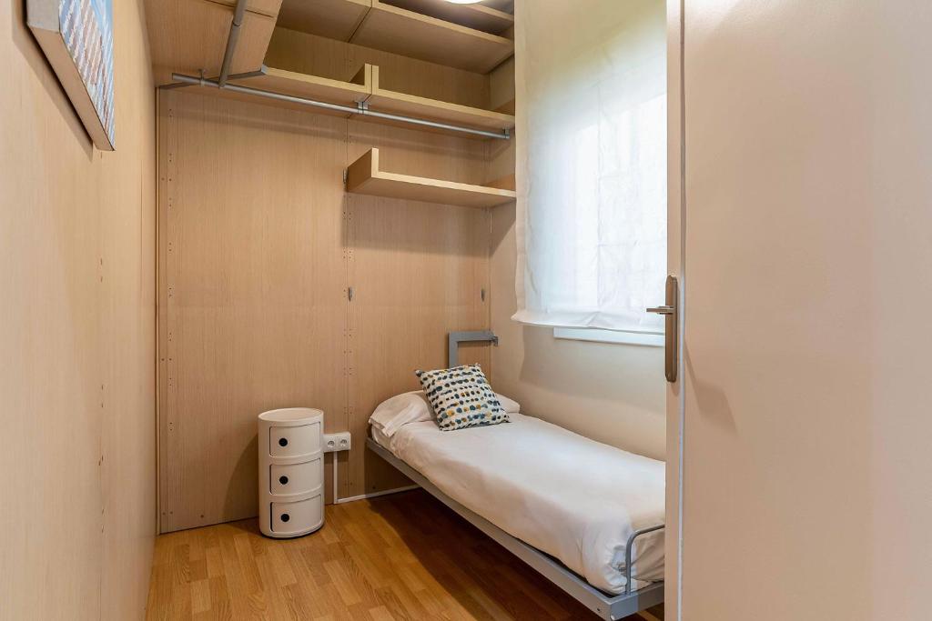 Posteľ alebo postele v izbe v ubytovaní AB Enric Granados Apartment
