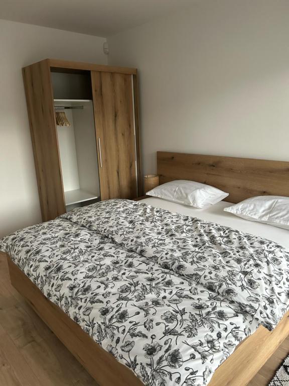 Postel nebo postele na pokoji v ubytování Chalets New Apartmány Ivachnová