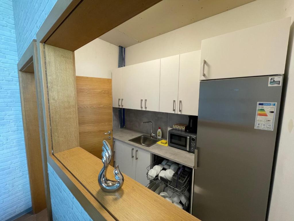 Kuchyň nebo kuchyňský kout v ubytování Sleep&Go Hostel Ljubljana